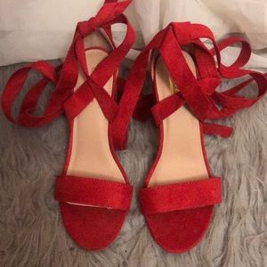 Size 6.5 Red heels. Never worn